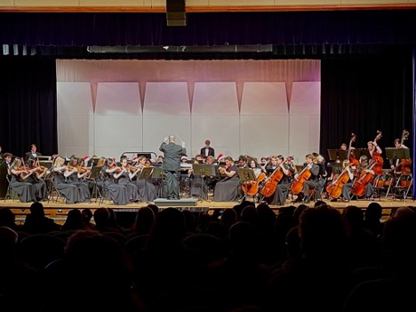 The Band and String Ensembles perform their holiday concert in the high school auditorium on Wednesday, Dec. 14, 2022. 