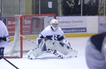 Connor Thomas prepares to save a shot at Mennen Sports Arena on Dec. 14, 2021
