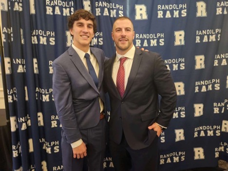 James Fusco (left) and Coach Will Nahan attend the end-of-season football banquet at The Mansion at Mountain Lakes on Dec. 10, 2022. 