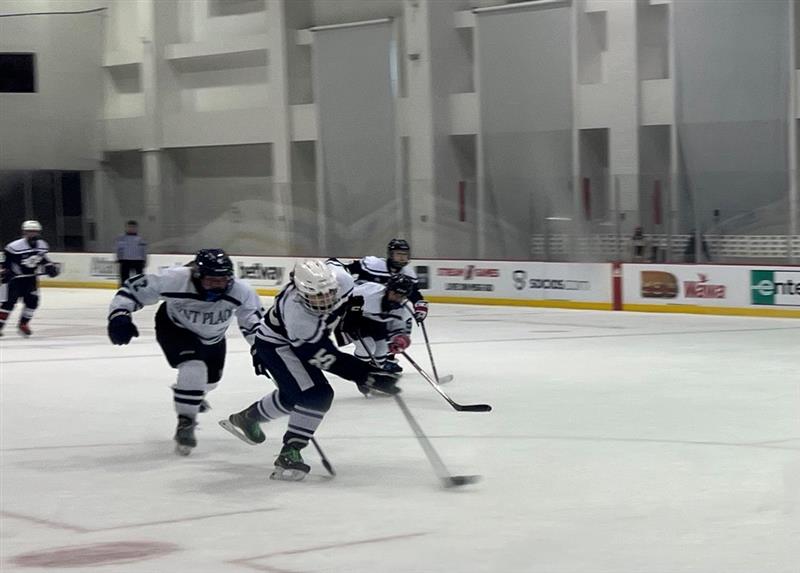 Freshman Ava Shadwell fights for the puck to win the point for Randolph, but the Girls Ice Hockey team ultimately falls to Kent Place, 2-1, in the Cohen-Cup semi finals, held at the Prudential Center on Feb. 13, 2023. 
