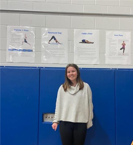 Gracie Schrader stands before one of the Calm Kiosks she created at the high school, which provide a space for students and teachers to mentally reset during the day, as her Girl Scout Gold Award project. 