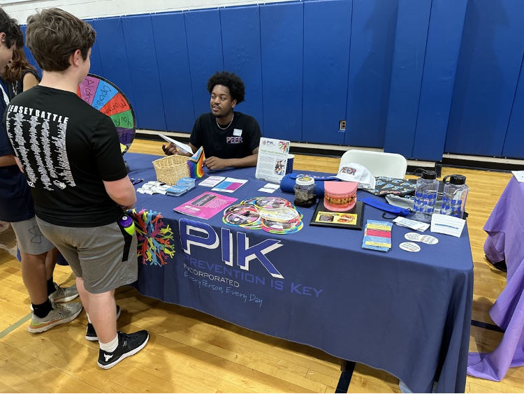 A PIK representative talks about the harmful effects of vaping to interested students at the second annual Wellness Fair, held on Friday, April 14, 2023. 