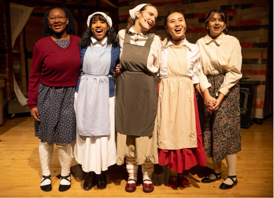 Freshman Hannah Hutchinson (Bielke), juniors Amelia Diaz (Hodel) and Amaia Biggan (Tzeitel), sophomore Tina Yuan (Chava) and sophomore Vaishnavi Swarna (Schprintze) perform the song “Matchmaker” in the RHS production of Fiddler on the Roof on March 24, 2023, in the high school auditorium.