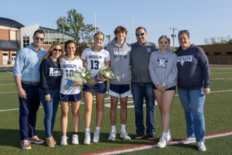 Randolph Girls Lacrosse co-captains Danielle Blumenthal (10) and Alexis Fleischer (13) enjoy senior night with their families before beating Mount Olive, 19-4, on Wednesday, May 10, 2023. 