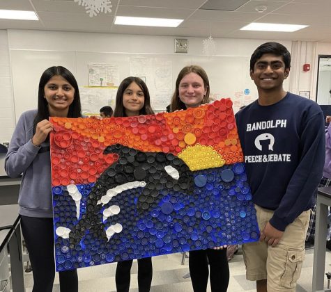 Green Club hosted Environmental Week from April 17 through April 21 at the high school. The festivities kicked off with Marine Life Monday, when club members created a vibrant bottle cap mural of an orca leaping through calm ocean waters beneath a picturesque sunset.