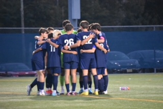 The Rams huddled up before beating Roxbury, 2-1, at DaSilva Field, on Wednesday, Sept. 27, 2023.