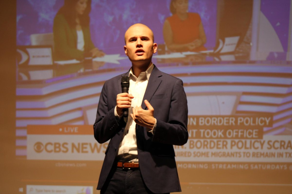 CBS Immigration Reporter and RHS Alumnus Camilo Montoya-Galvez  (15) speaks to the journalism, media and Heritage students at the high school on Friday, Oct. 27, in the auditorium. 