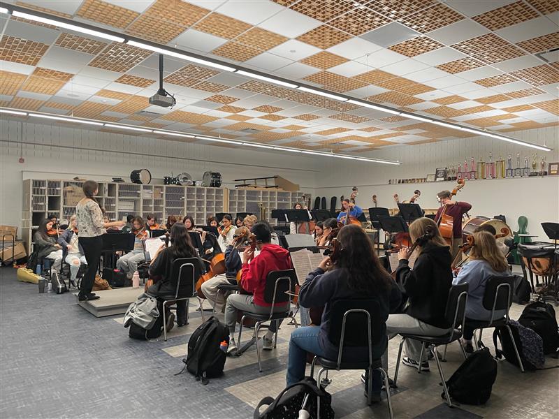 Students taking an orchestra class at RHS practice a piece of music on Nov. 15, 2023.