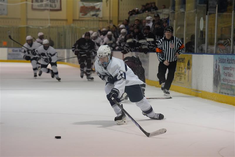 Junior Jacob Campbell charges toward the Morristown goal on the way to a Rams victory, 6-2, on Thursday, Dec. 7, 2023, at Mennen Arena. 