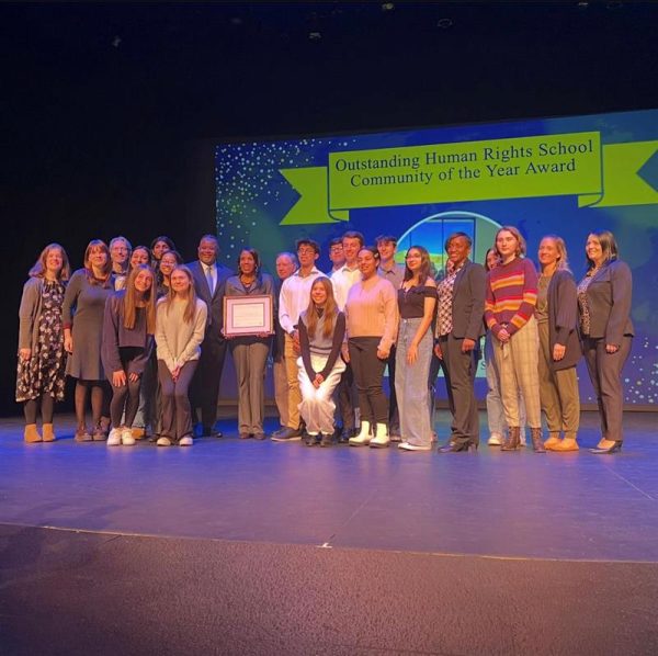 Members of Team Harmony and the advanced dance program at RHS receive the prestigious “Outstanding Human Rights School Community of the Year Award” on Friday, Dec. 8, at Kean University. 