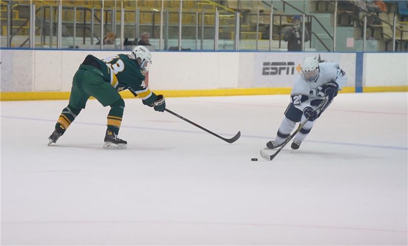 Junior Jacob Campbell charges towards the net on a solo offensive play that ended with a goal on the way to Randolph beating Morris Knolls, 9-4, on Monday, December 11, 2023. 