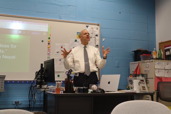 Barry Haines, intermin VP at RHS, speaks to Mrs. Finnells journalism students on Feb. 27, 2024, about his upcoming job as director of curriculum at Kopila Valley School in Nepal, which he starts next month. 