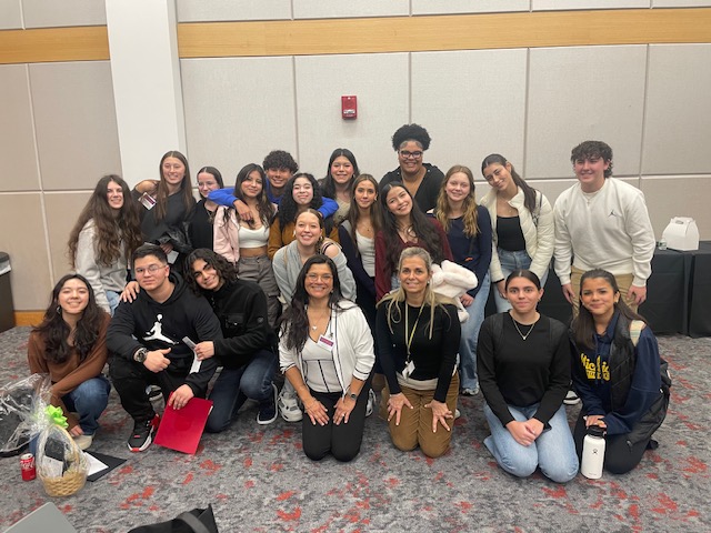 RHS students competed in the 2024 Somos NJ Poetry & Culture Festival on March 21, 2024, with five of them taking home top prizes. Pictured is RHS Team Somos, accompanied by Spanish Teachers Sybil Sanchez-Jacome and Estela Flood (front row, center).  