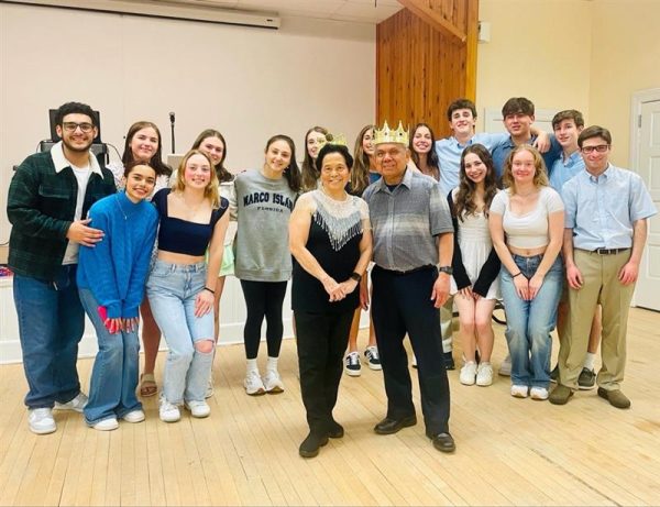 RHS seniors pose with Randolph residents Manuel Vince-Cruz and Delia Cruz, who were named King and Queen of the Senior Citizen Prom, at the Randolph Community Center on May 7, 2024. 