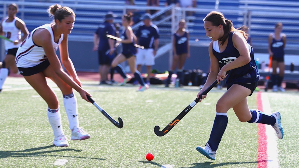 Senior Co-Captain Rebecca Dasti carries the ball up the field during a scrimmage against Morristown Beard on Aug. 27. 