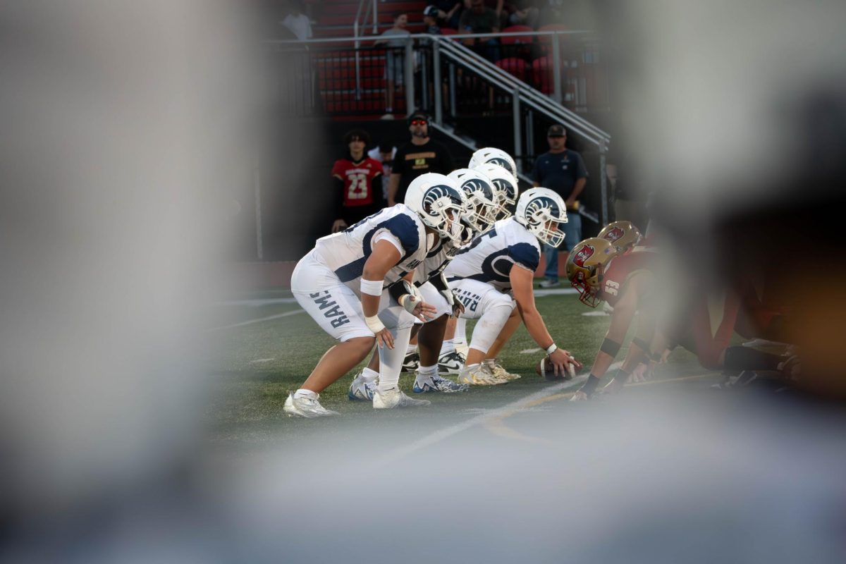 The Rams offensive line looks at the Mt. Olive defense before the snap of the ball.  