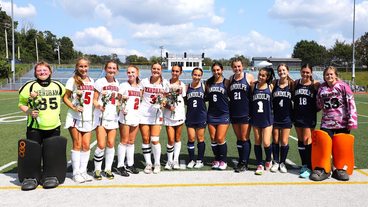 Randolph and Mendham field hockey players line up for the senior photo at Randolph's Senior Day game on Sept. 14.
