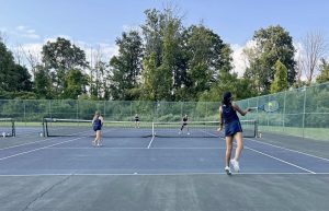 Second doubles players Amy Myerson and Riyana Chaudhary communicated well on the court, contributing to Randolph’s 5-0 win against Pope John, on Friday, Sept. 6.
