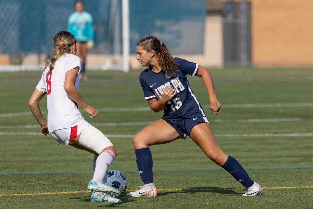 Senior Kayla Brand dribbles past a Mount Olive midfielder on the way to a 5-0 Randolph victory on Wednesday, Sept. 4.
