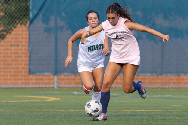 Senior co-captain Rylie Van Wingerden accelerates away from a North Hunterdon midfielder 