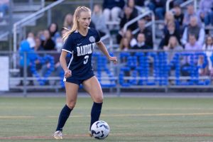 Junior Carlie Wysocki dribbles the ball up the field on the way to a Rams victory against Sparta on Senior Night, Tuesday, Oct. 1.
