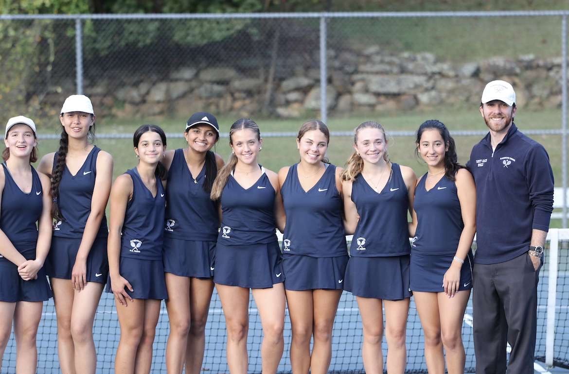 

The Girls Tennis team poses for a picture after playing the final match of the season on Tuesday, October 15. 
