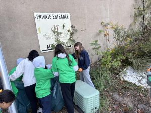 
Members of Green Club work together to pick up trash across Morristown on Saturday, October 19.
