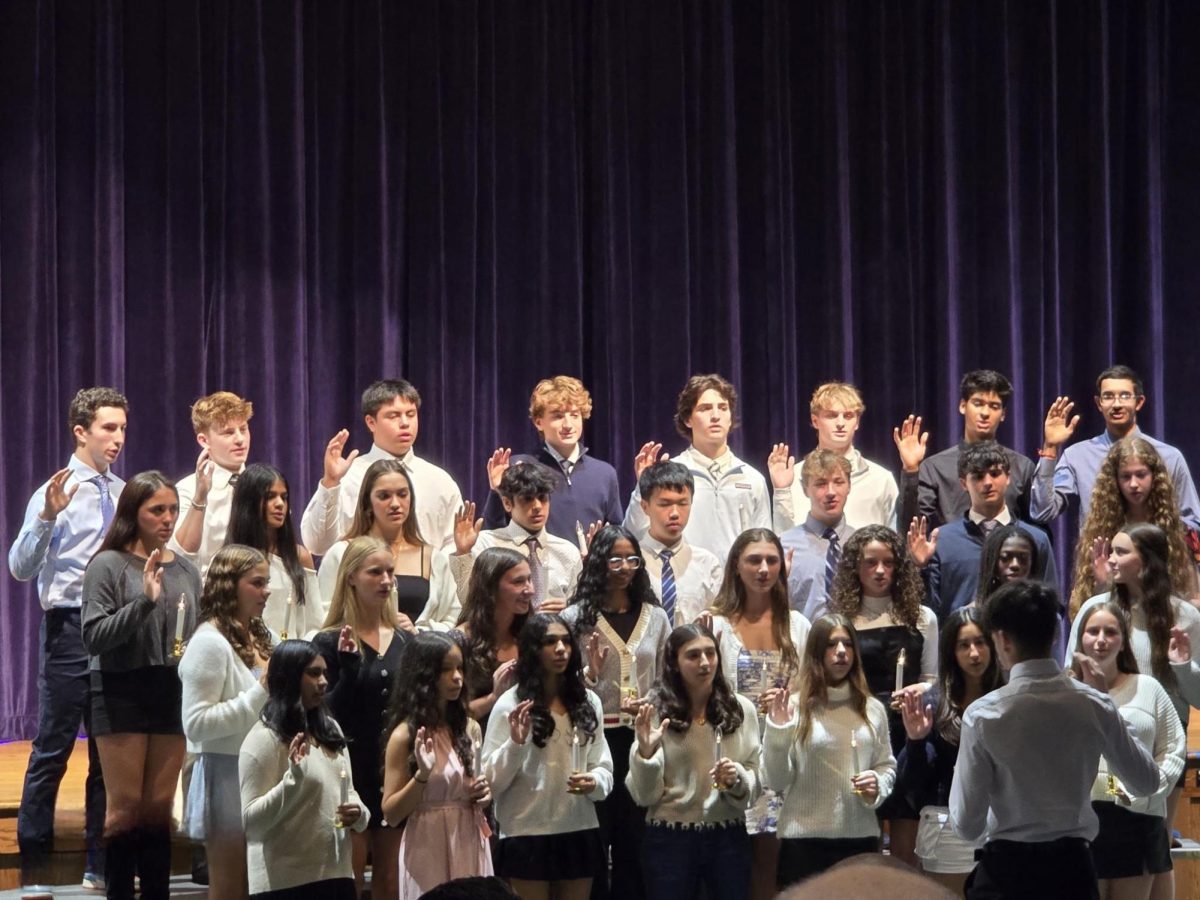 Thirty-one students are inducted into the RHS chapter of NHS in a ceremony held in the high school auditorium on Wednesday, Oct. 30.