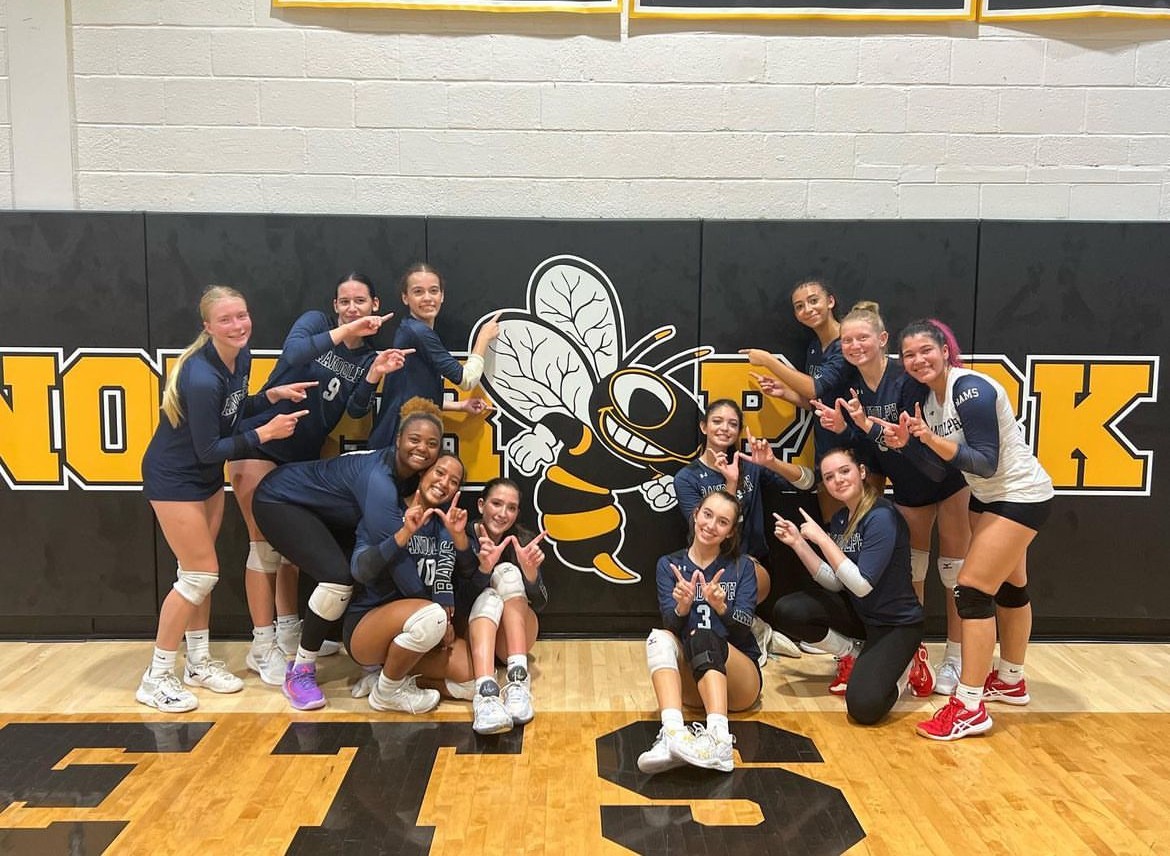 

The Rams pose for a victory pic, making “Ws” with their fingers to show their win against Hanover Park on Thursday, Sept. 26. 
