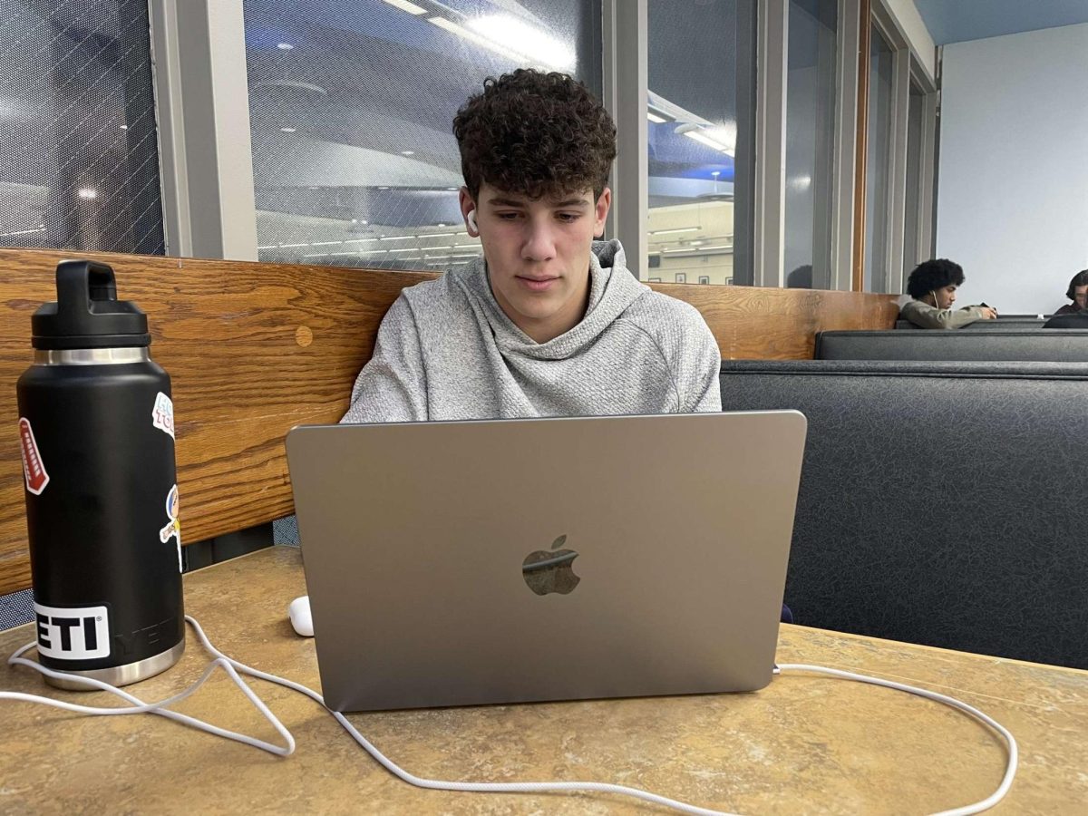 RHS senior Philip Zamloot spends a recent Zero Period catching up on schoolwork in the Media Center, a popular place for students to spend this 50-minute block of free time, offered during the school day. 