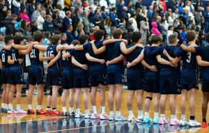 The Rams line up for the Pledge of Allegiance before the tipoff in a thrilling season opener that ended with Randolph beating Roxbury 55-53 on Saturday, Dec. 14.  