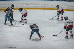 Rams Charna Torres and Amelia Kolbik get ready for the puck drop on the way to a 10-2 victory over Newark East Side at Aspen Arena on Sunday, Jan 29.