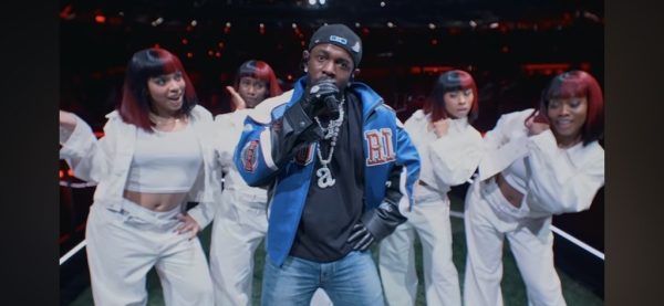 Kendrick Lamar performs with his backup dancers at the Super Bowl LIX halftime show. 