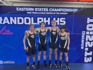 Distance Medley Relay team members (from left) Thomas Amato, Kennan Byers, Preston Gumann and Jacob Conti celebrate after setting a new school record at the Eastern States Championships on March 4, 2025. 