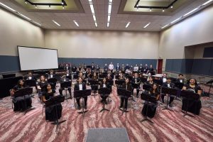 The RHS Wind Ensemble assembles for its performance at the NJMEA Conference, held in Atlantic City on Monday, Feb. 20, 2025. 
