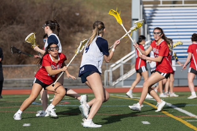 Varsity Girls Lacrosse player Avery Liston takes the ball to the cage during a recent scrimmage against Morris Hills on Monday, March 17. 