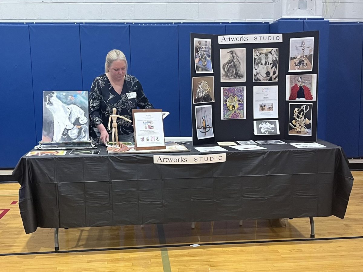 An Artworks Studio representative talked to RHS students about the studio's art workshops at the fourth annual Wellness Fair on Friday, April 4, 2025.
