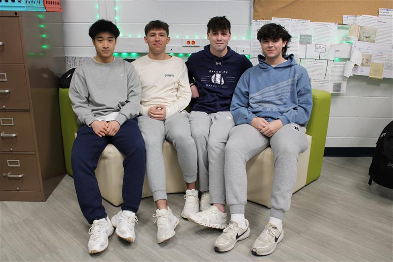 RHS seniors (from left) Kevin Tinio, Jayden DeCarvalho, Zack Allen and Adam Sokolowski wear clothing that conveys many of this year's style trends for guys, including logos, sweats and neutral colors. 
