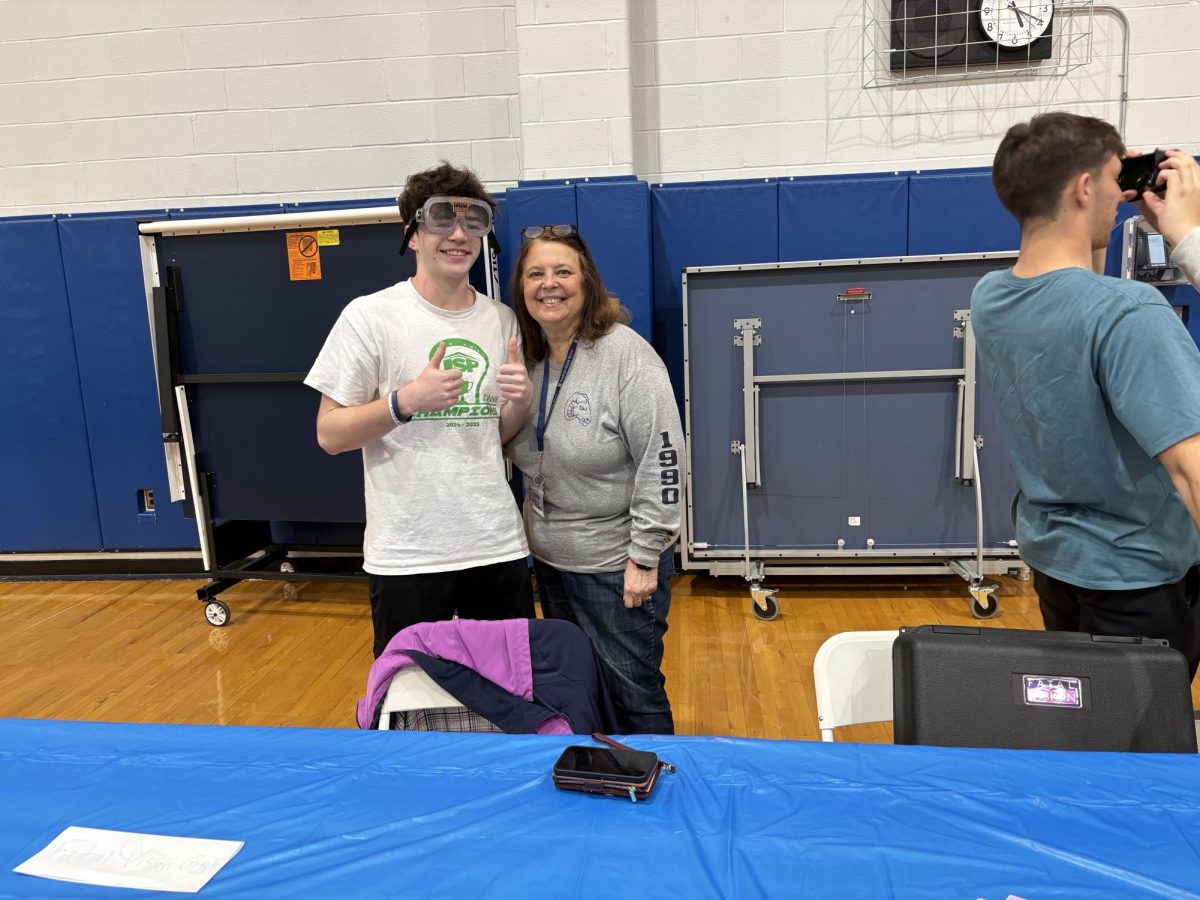 RHS Counselor Maryalice Thomas ran a "Drunk Goggles" table to show RHS students the dangers and difficulties of functioning while drunk at the fourth annual Wellness Fair, on Friday, April 4, 2025.
