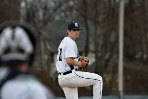 Sophomore Matthew Paladino prepares to deliver a pitch in his start against Don Bosco on April 4, 2025.  
