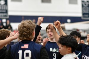 

The Boys Volleyball team gets ready to step onto the court to play Morristown on April 14, 2025.  
