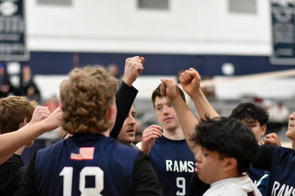 

The Boys Volleyball team gets ready to step onto the court to play Morristown on April 14, 2025.  
