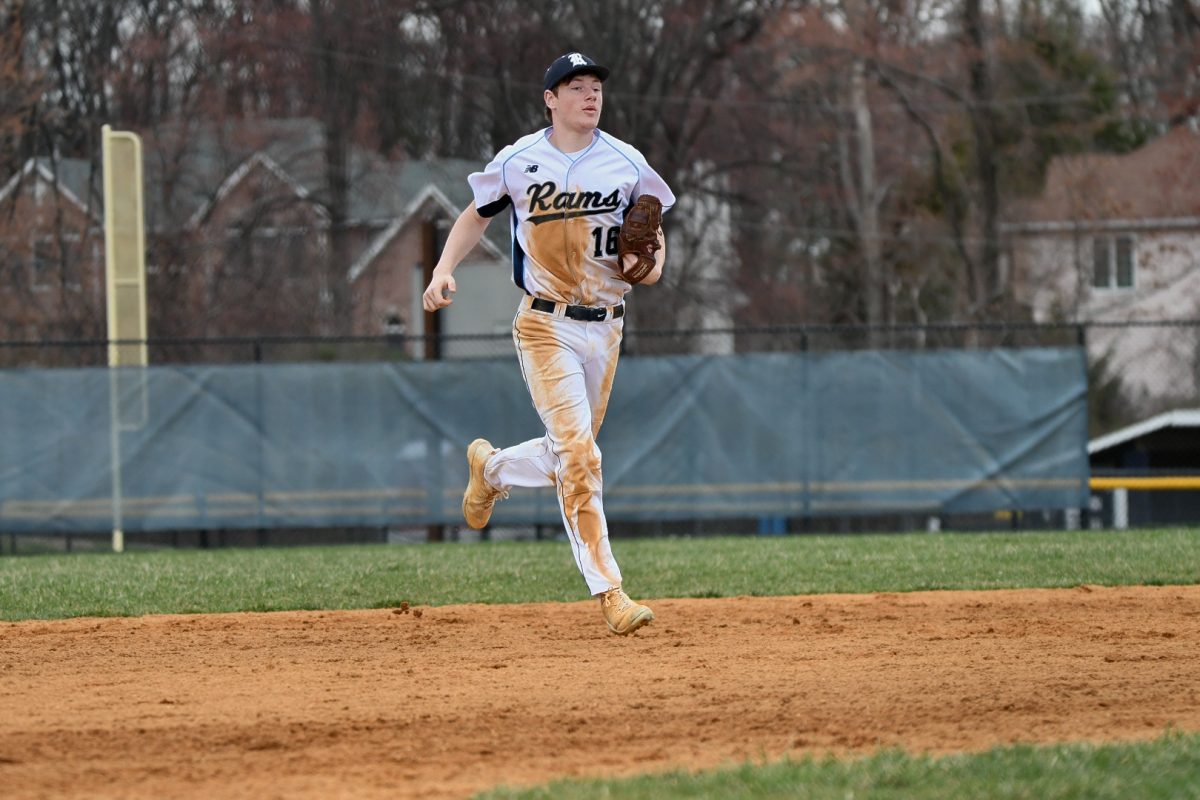 Freshman varsity Baseball player Andrew Swanick jogs in from the outfield as Randolph and Don Bosco switch sides on April 4, 2025.  
