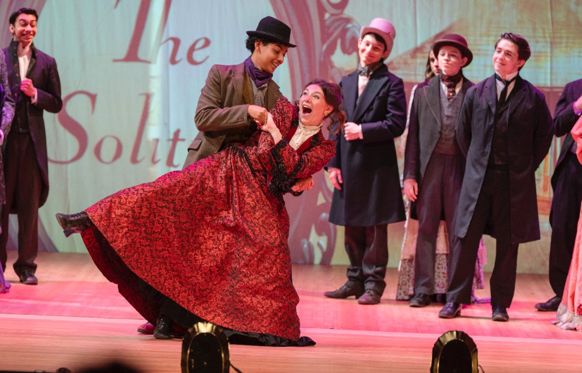 Author and RHS senior Carly Ellermeyer dances with Delbarton senior Kelvin Pierre during a performance of the musical, "The Mystery of Edwin Drood," staged at Delbarton School on February 1, 2025.
 