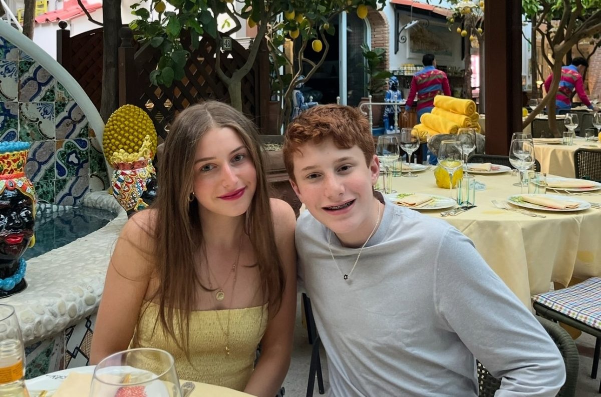 The author and her brother, Jake, dine al fresco on a recent family trip to Capri, Italy. 