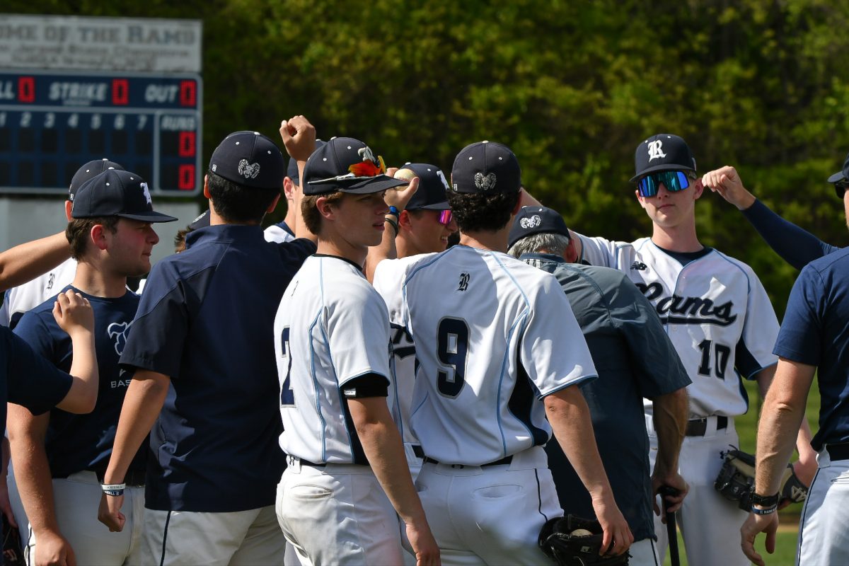 The Rams break the huddle and prepare to take the field against Roxbury on May 12, 2025.
 