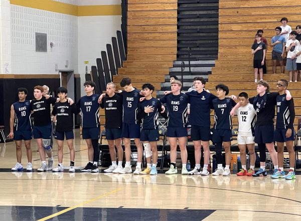 Boys Volleyball lines up for the National Anthem prior to the Group 2 state final on Wednesday, June 11. 