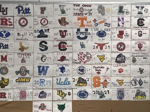 The college commitment board in English and Journalism Teacher Janice Finnell's classroom features the schools some of her Class of 2025 seniors will be attending in the fall.