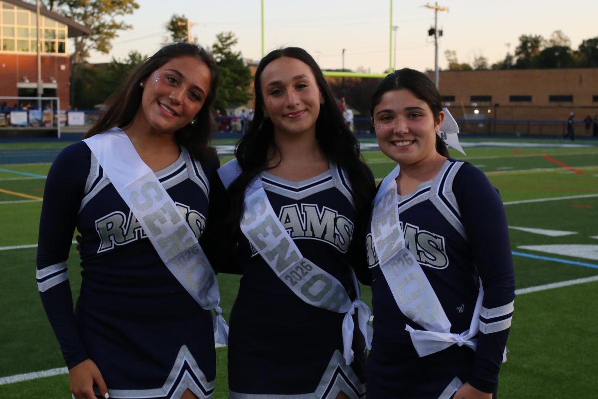 The senior members of Randolph Football Cheer—(from left) Katie Ellermeyer, Samantha Schachter and Rachel Sukoneck—strike a pose on Senior Night, on Friday, Sept. 12, 2025.
