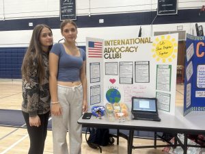 Senior Anna Jankowska (left) and junior Aleksandra Jankowska showcase the International Advocacy Club at the annual RHS Club Fair, on Wednesday, Sept. 18, 2025. .